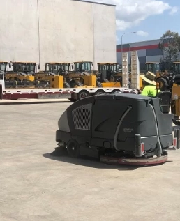 Warehouse floor sweeping in progress